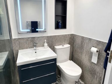 A bathroom with a sink and toilet at Jacks Place in Whitby
