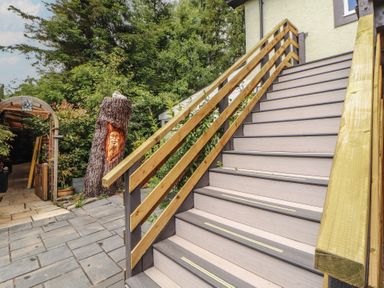 An outdoor staircase leading to a building at Eden House in Bardsea