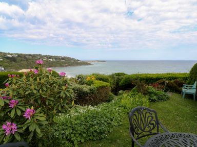 A garden overlooking the ocean at Apartment 1 Llewellan in St Ives