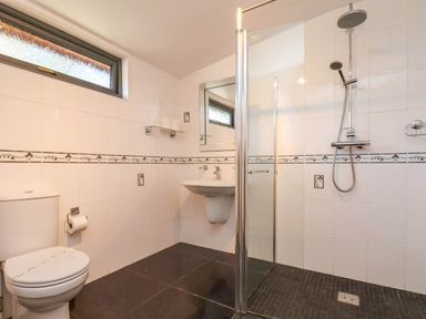 A bathroom with sink and shower at Violet Lodge in Saltburn-by-the-Sea