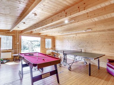 A game room with a pool table and a ping pong table at Horseshoe in Little Glemham near Wickham Market