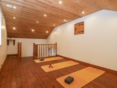 A yoga studio with mats and blocks at The Croft in Vowchurch near Peterchurch