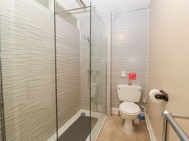 A bathroom with a shower and toilet at The Croft in Vowchurch near Peterchurch