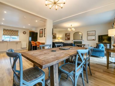 A dining room with a table and chairs at Jubilee at the Graythwaite Estate near Hawkshead