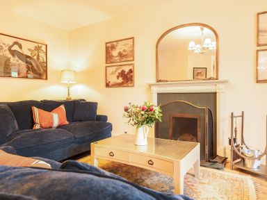 A living room with a sofa and coffee table at Jubilee at the Graythwaite Estate in Graythwaite near Hawkshead