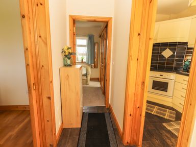 A hallway leading to a kitchen at Moybella Lodge in Lisselton near Ballybunion, County Kerry