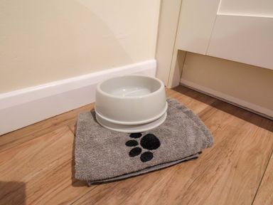 A pet bowl on a towel at La Rochelle in Whitby