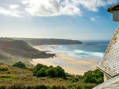 A beach view with hills and sea at Carn Eve Sennen Cove near St Just