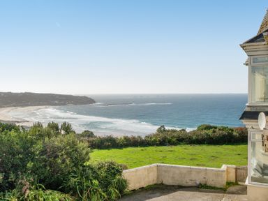 View of the ocean and beach from a property at Carn Eve Sennen Cove near St Just
