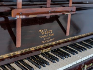A piano with a keyboard and music stand at Carn Eve in Sennen Cove near St Just