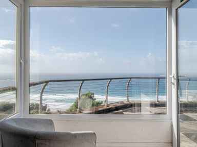 A window view of the ocean at Carn Eve Sennen Cove near St Just