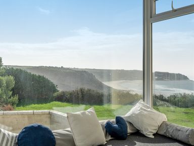 A room with cushions and a view of the landscape at Carn Eve Sennen Cove near St Just