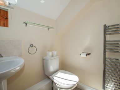 A bathroom with a sink and toilet at The Wainhouse in Bockleton near Tenbury Wells