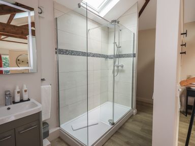 A bathroom with a shower and sink at Acorn in Bowness-on-Windermere