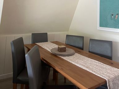 A dining room with a table and chairs at Lodge 22, Bodmin Holiday Park, Cornwall