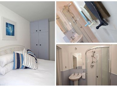 A bedroom with a bed and pillows next to a wardrobe and a bathroom with a shower and sink at Porthcurno Bay View in Porthcurno