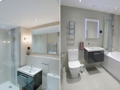 A bathroom with a shower enclosure, sink, toilet, bathtub, and two mirrors at 5 Arlington Villas in Ilfracombe