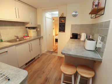 A kitchen with a sink and appliances at Archers in Keswick