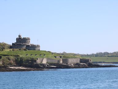 A coastal fort with cannons on a grassy hill overlooking the sea at Birch in Truro