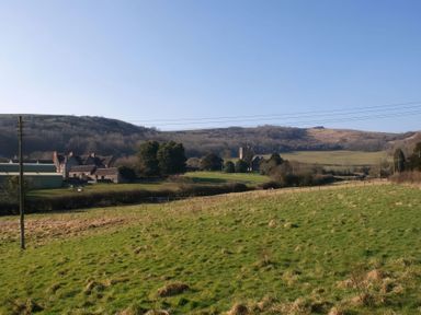 A rural landscape with fields and hills at The Barn in Compton Bishop, near Cheddar