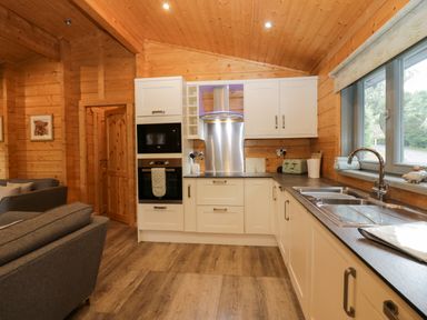 A kitchen with modern appliances at Oak Lodge in Pennington near Ulverston