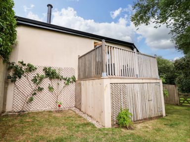 A house with a deck and garden area at Cawsand in Tideford
