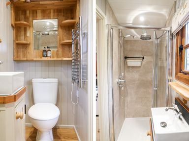 A bathroom with a toilet and sink next to a separate shower area with a window at Little Silver Fox in High Bickington