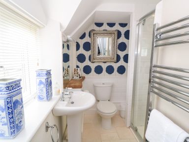 A bathroom with a shower and sink at Fairview Cottage in Milton-Under-Wychwood