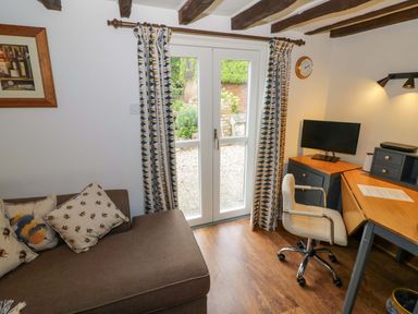 An office with a desk and computer at Elmhurst Cottage Lower Quinton