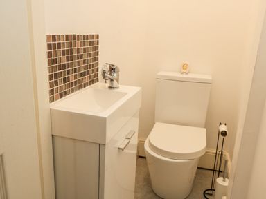 A bathroom with a sink and toilet at Rojoy in Salisbury