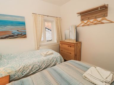 A bedroom with two beds and a dresser at Rojoy in Salisbury