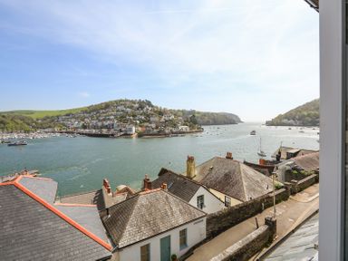 A view of a river with boats and houses on hills beside it at Kings View in Dartmouth