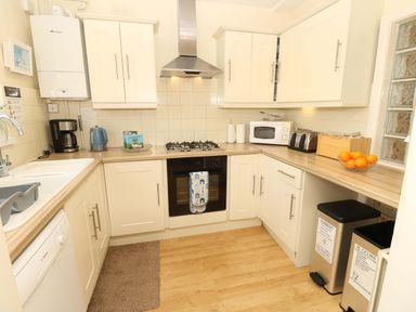 A kitchen with appliances and fixtures at 32 Cranleigh Close Tuckton