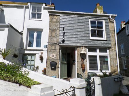 A house with a door and windows at Labour in Vain, St Ives
