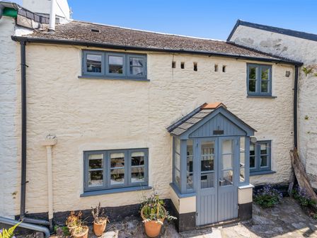 An outdoor view of a house exterior with a porch at 3 Glendale Cottages Dittisham near Dartmouth