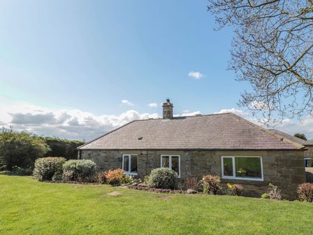 A house with garden and grass at Whinney Moor in 