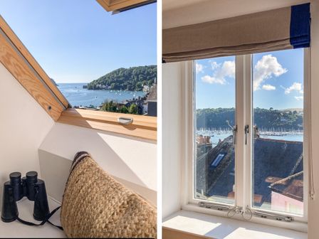 Two views of a coastal town and harbor seen through different windows with a pair of binoculars and a woven cushion on the windowsill at Avondale in Dartmouth