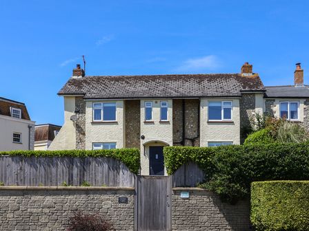 A house with windows and a front door in Lyme Regis