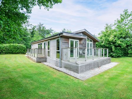 A house with a deck and glass railing in the outdoor area at 5 Faraway Fields Dobwalls