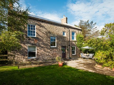 A house with a garden and patio furniture at Wonderland in Tweedmouth, Berwick-Upon-Tweed