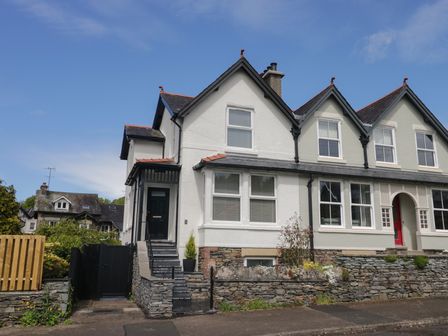 A house with a front door and windows at 5 Thornbarrow Road