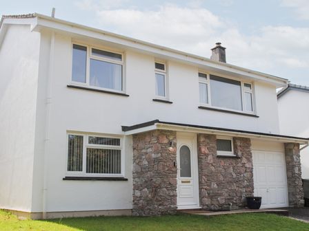 A house with stone and white exterior at 15 Beadon Road Salcombe