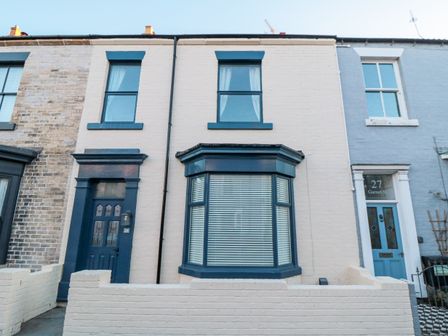 A terraced house with a bay window and blue trim at 29 Garnet Street in Saltburn-By-The-Sea