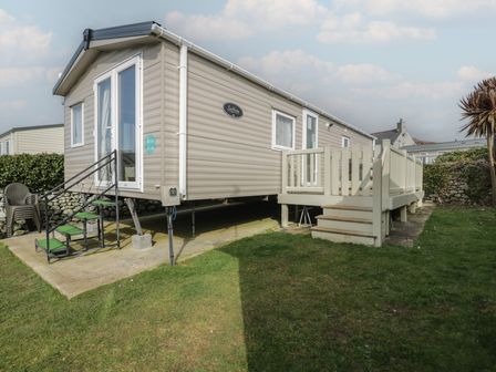 A caravan with stairs and a deck at Gold Caravan (316) Talybont