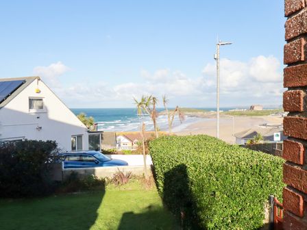 A view of the sea and beach from a property at Pipers Newquay