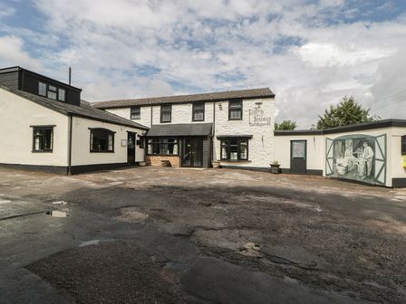 An exterior view of Penny Farthing Inn in Aston Crews near Ross-On-Wye