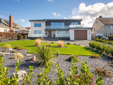 A house with a garden and pathway at 70 Deganwy Road in Deganwy