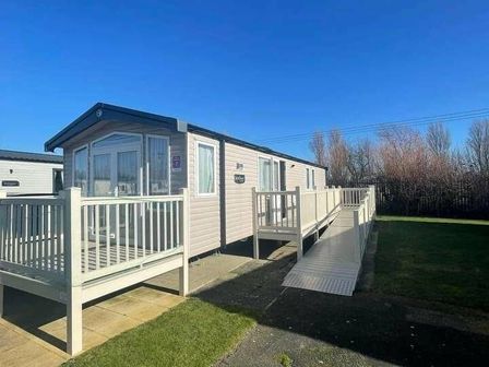 a holiday home with a ramp and deck at Butlins Skegness - Holiday Accommodation 15131, Skegness
