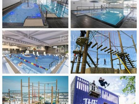 a recreational area with pools, climbing structures, and a rope course at Whitehouse Leisure Park - Holiday Accommodation 21602, Towyn