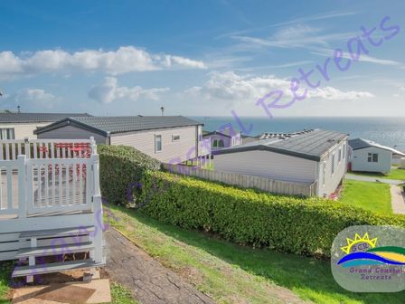 a view of holiday caravans near the sea at Devon Cliffs Holiday Park - Holiday Accommodation 6955 Exmouth